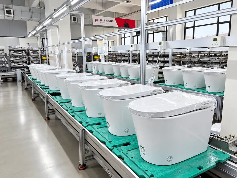 Finished smart toilets undergoing aging and reliability testing at the DZOZO factory